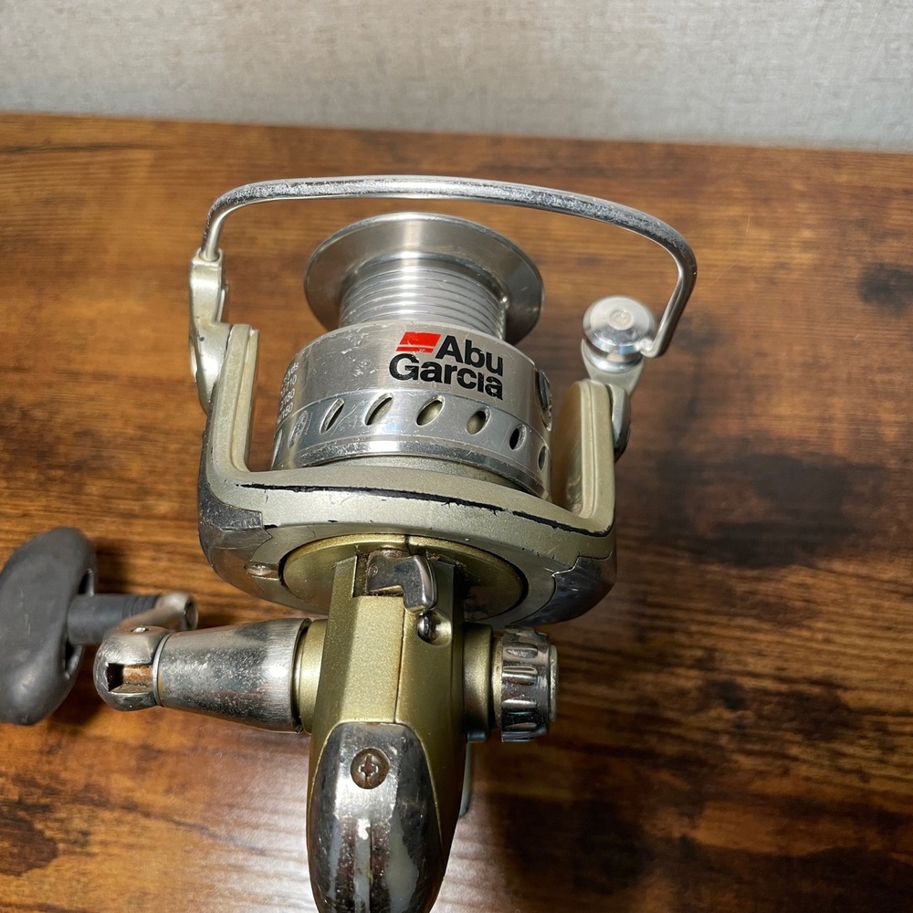 Abu Garcia Cardinal 504 Spinning Fishing Reel Champagne Silver Rear Drag
